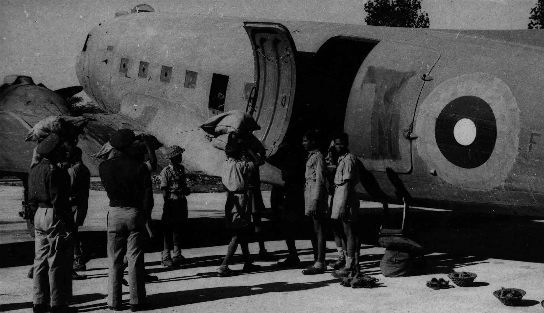 Loading supplies into RAF Douglas Dakota Mk. III, Burma, 10 June 1944 (RAFM PC71/19/608) Loading supplies into RAF Douglas Dakota Mk. III, Burma, 10 June 1944 (RAFM PC71/19/608)