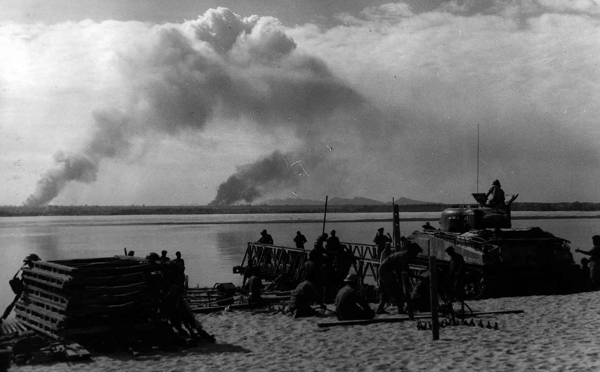14th Army M4 Sherman tank is loaded on a ferry while the battle to establish bridgehead across Irrawaddy River is in progress, February 1945 (RAFM PC71/19/1691) 14th Army M4 Sherman tank is loaded on a ferry while the battle to establish bridgehead across Irrawaddy River is in progress, February 1945 (RAFM PC71/19/1691)