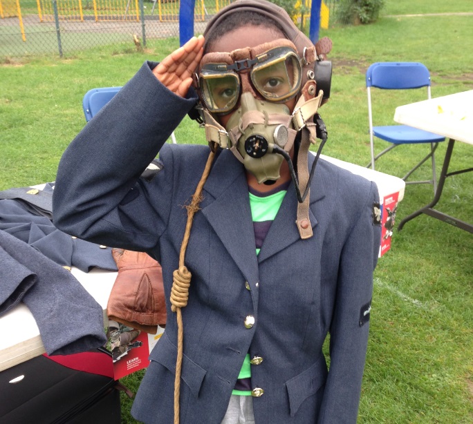 A young member of the community wearing our WW2 Handling Collection