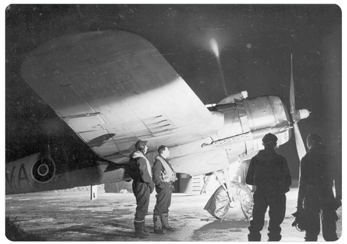 Image showing pilots on a runway at night c1940