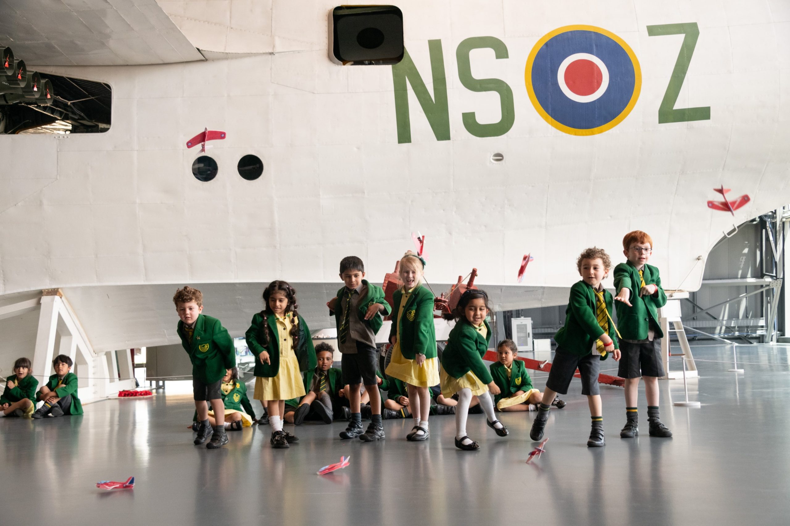 Childern Throwing Gliders