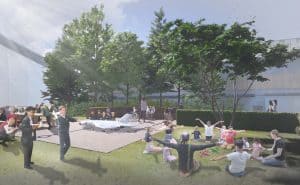 Hangar 2 Public Realm Artwork - Children and family out side Hangar 2 playing and relaxing