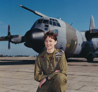 Flight Lieutenant Julie Gibson with a Lockheed Hercules