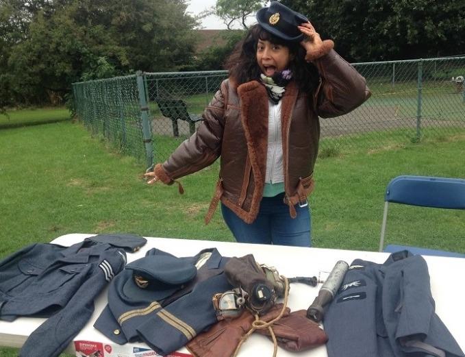 A Volunteer at the Crafts Table