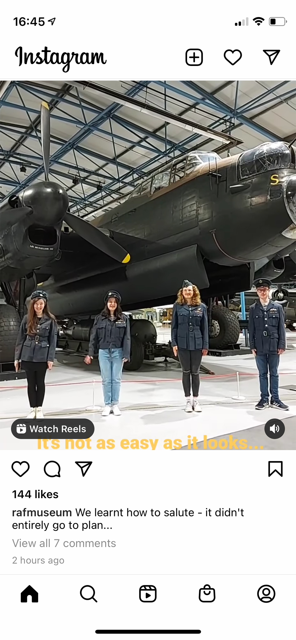 Kids in Museum's Digital Take Over Day 2024 - images shows members of our Youth Panel dressed in uniforms standing underneath our Lancaster Bomber