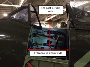 lose-up of a Spitfire cockpit entrance showing width measurements — entrance is 43cm wide, seat is 70cm wide.