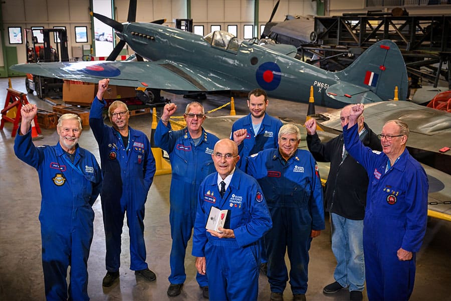 Volunteers in blue uniforms